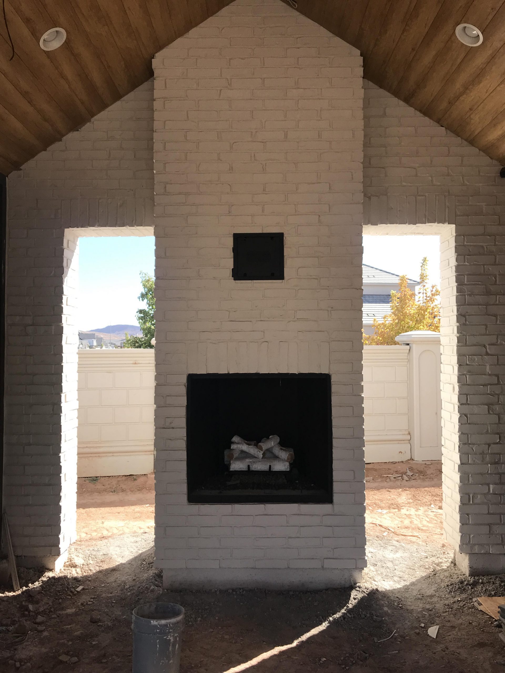 Outdoor White Brick Fireplace
