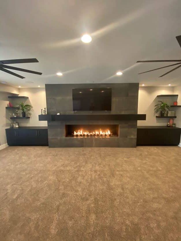 Large custom fireplace with gray tile
