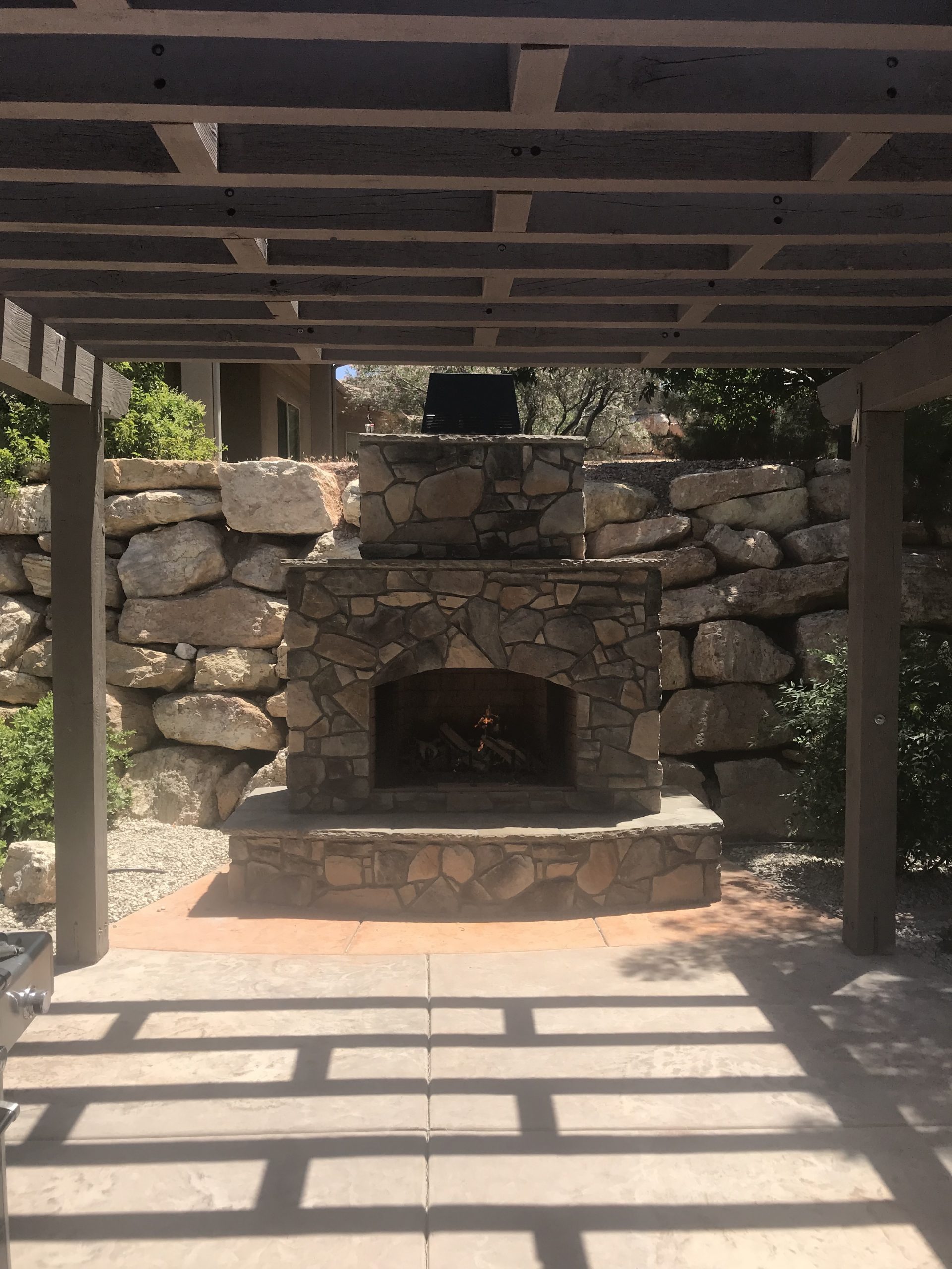 custom outdoor fireplace with chimney 