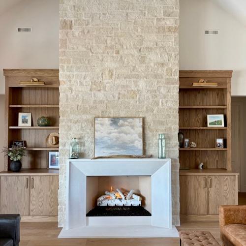 Golden Blount 5030 Fireplace with herringbone interior panels and white birch logs
