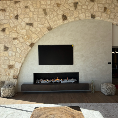 10 foot Mason-Lite custom fireplace with birch logs and lava rock